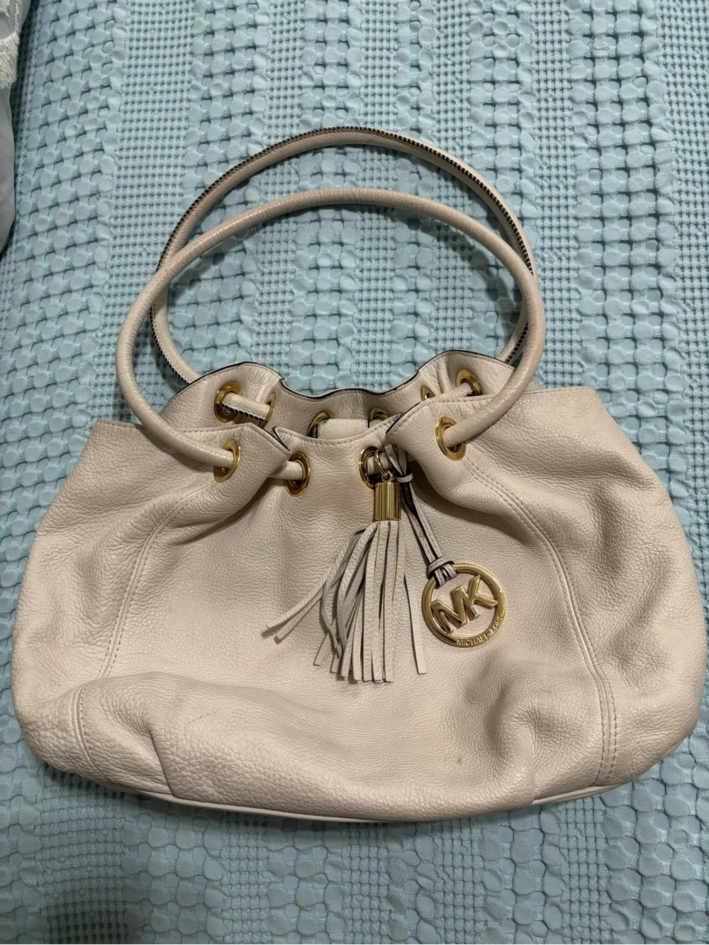 Michael Kors Cream Leather Drawstring Shoulder Bag with Tassel and Gold Hardware